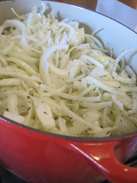 sliced onions in pot